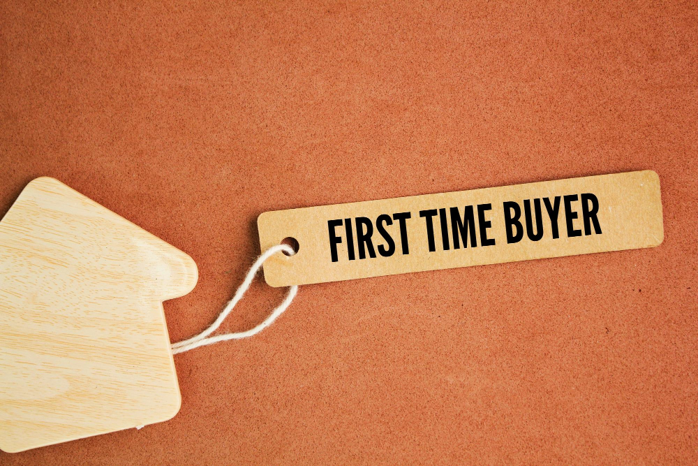 First-time buyer reviewing an interest-only mortgage repayment plan with an adviser