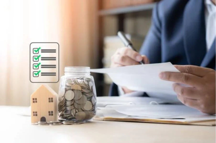 Offset mortgage UK showing savings jar and property model used to reduce mortgage interest costs